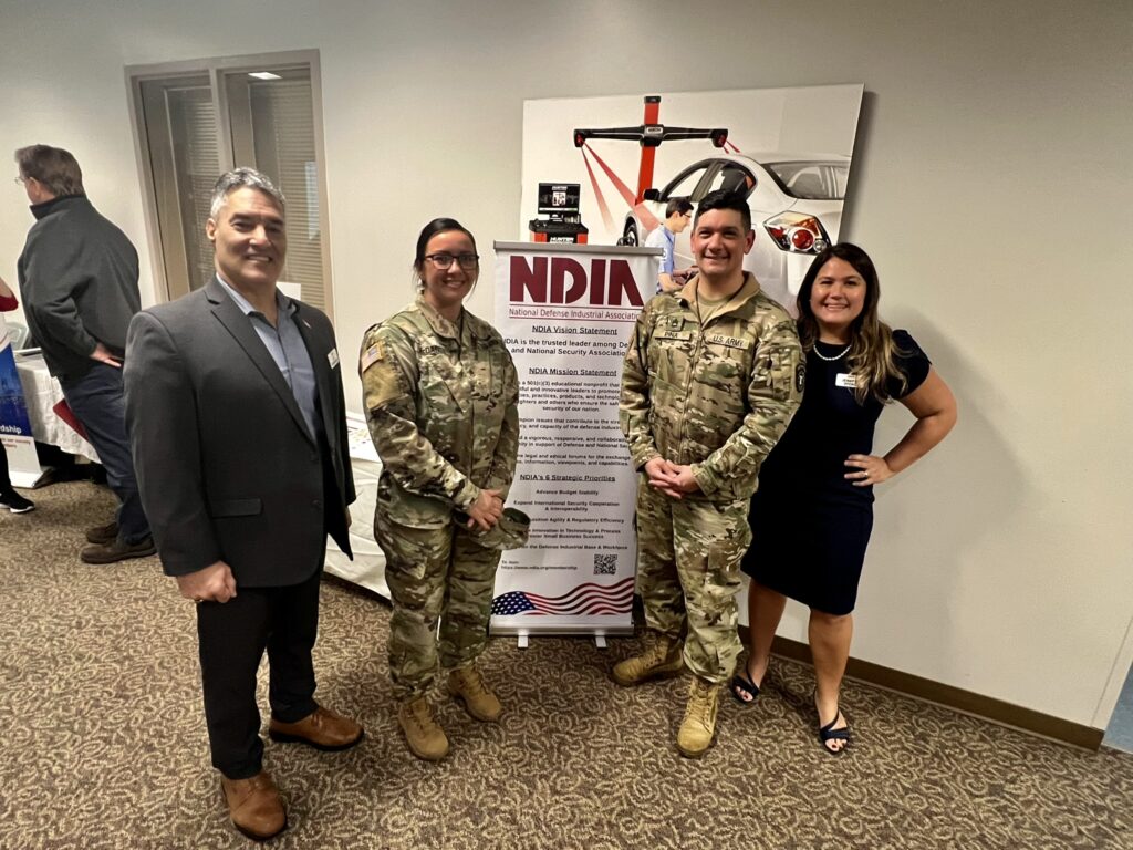 NDIA First Coast members pose with warfighters at the 2024 STEM event at FSCJ Downtown Campus