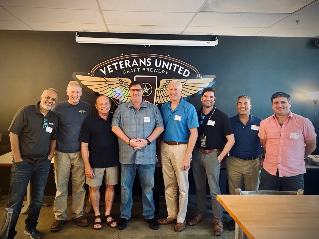 The NDIA First Coast team poses at the Veterans United Social event in 2021.